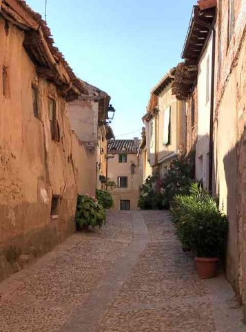 A typical old street in the historic centre of Lerma in Burgos, Spain.